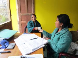 Aadiba cooperative member pays back her microloan, January 2020