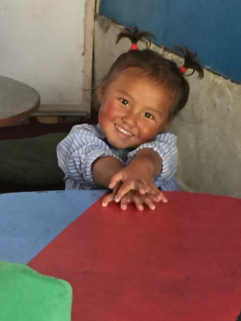 Young girl in Guranse classroom